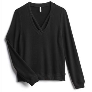 Cross front soft spun knit top